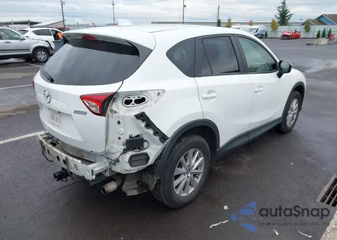 2015 Mazda Cx-5 Touring z USA, uszkodzony, nr VIN JM3KE2CY7F0546740